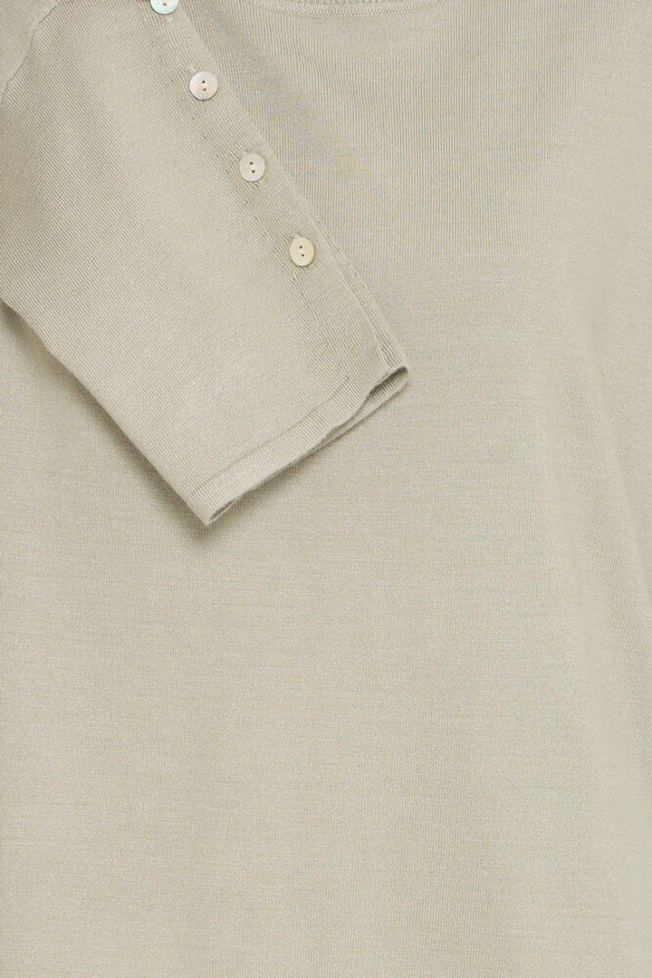 FRANSA Desert Sage Knit Top featuring a soft, cozy fabric with a relaxed fit and button details for casual wear.