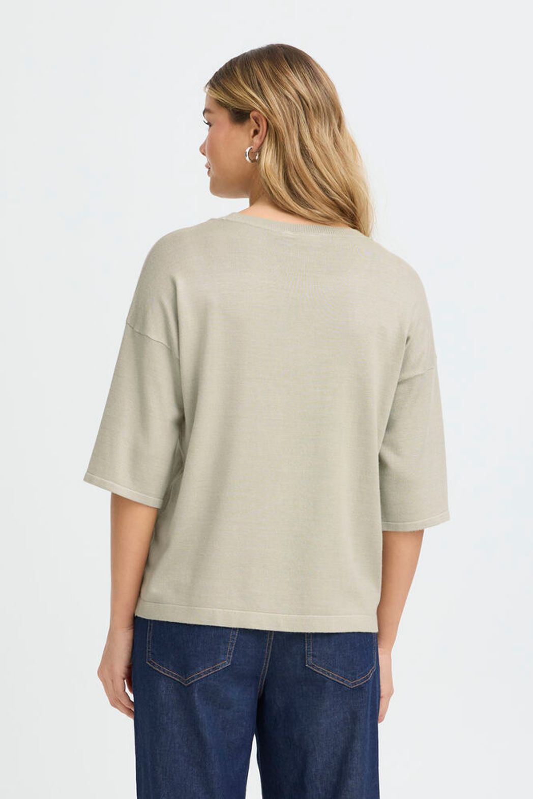 FRANSA Desert Sage knit top featuring a soft, cozy fabric with a relaxed fit and button sleeve detailing.