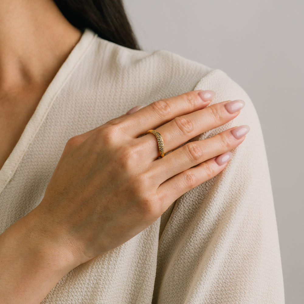Lover's Tempo Gold Crest Dome Ring featuring a smooth, rounded gold band with sparkling cubic zirconia accents for elegant style.