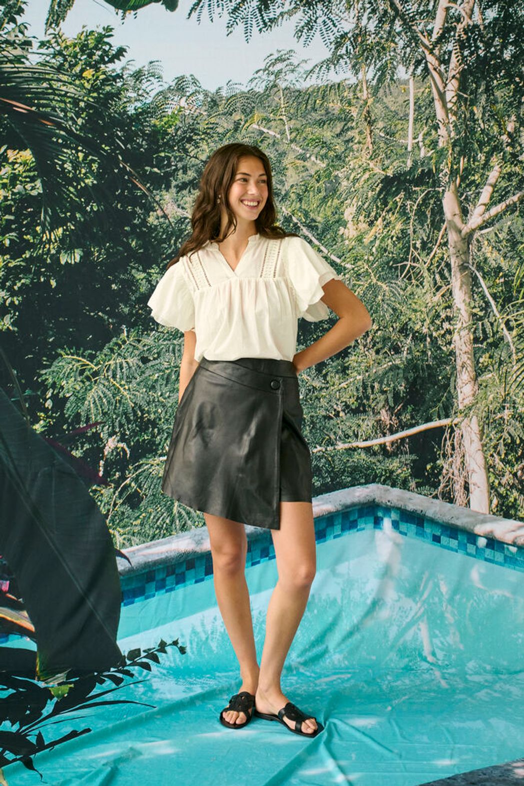 Culture Catinka cotton blouse featuring a relaxed fit, lightweight fabric, and stylish design with a V-neck and ruffle sleeves.