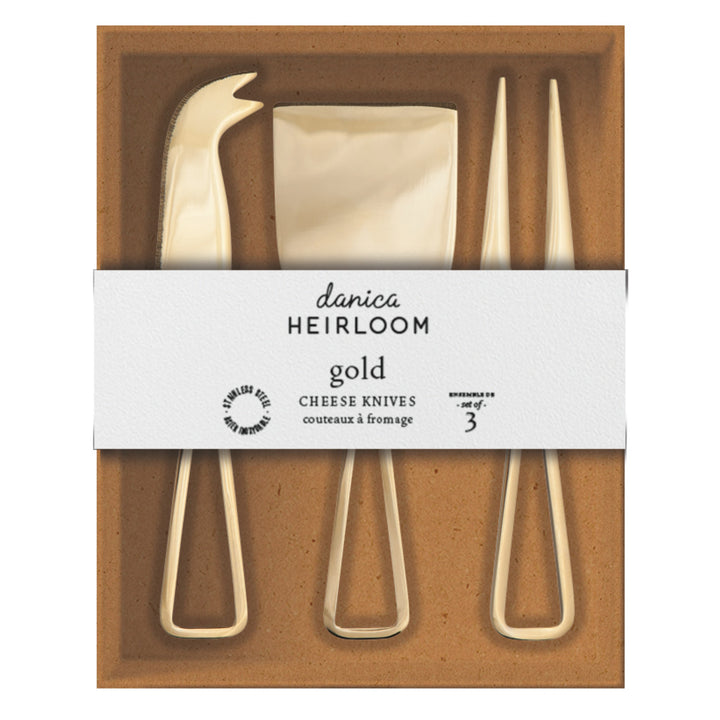 Danica gold cheese knife set with three cheese knives featuring stylish gold handles and stainless steel blades for cheese serving.