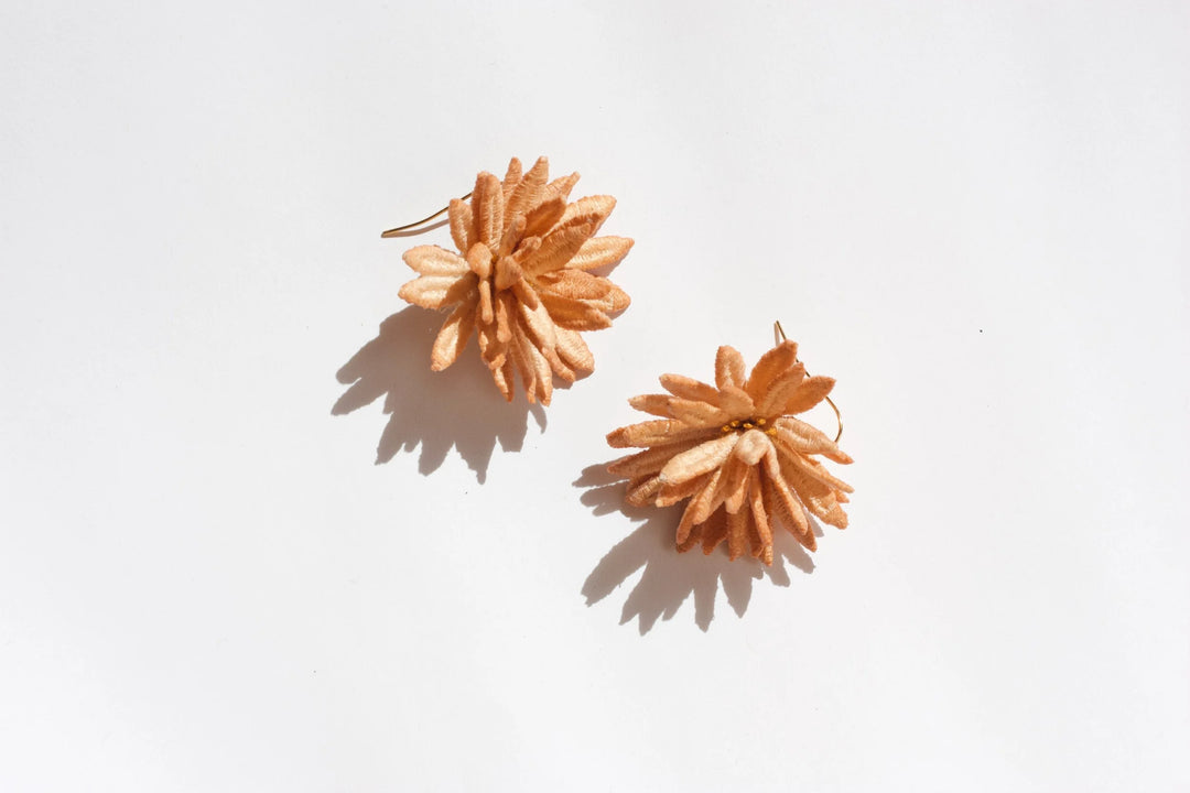 Ilk Jewelry chrysanthemum flower earring featuring detailed floral design in vintage lace and gold-tone finish on a simple earring hook.