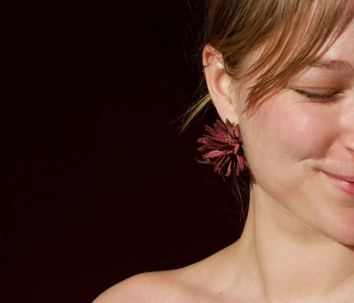 Burgundy chrysanthemum lace earring by Ilk Jewelry, featuring intricate floral design and elegant craftsmanship.