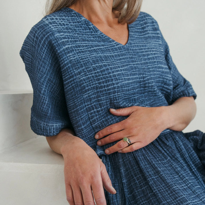 Pokoloko crinkle crop top, short sleeve blouse with textured fabric and relaxed fit, ideal for casual summer outfits.
