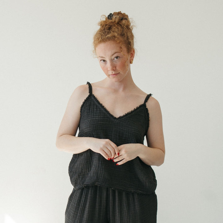 Crinkle cotton strappy tank top by Pokoloko, featuring lightweight, breathable fabric and frayed straps for a comfortable fit.