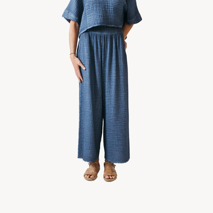 Pokoloko crinkle palazzo pants in denim fabric, flowy wide-leg longewear with textured crinkle design.