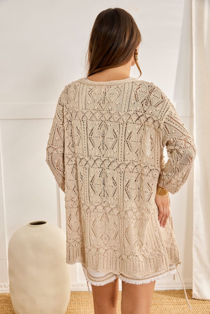 NKN by Nekane Dara open-knit cardigan in soft, lightweight fabric with a relaxed fit, featuring a stylish open front design.