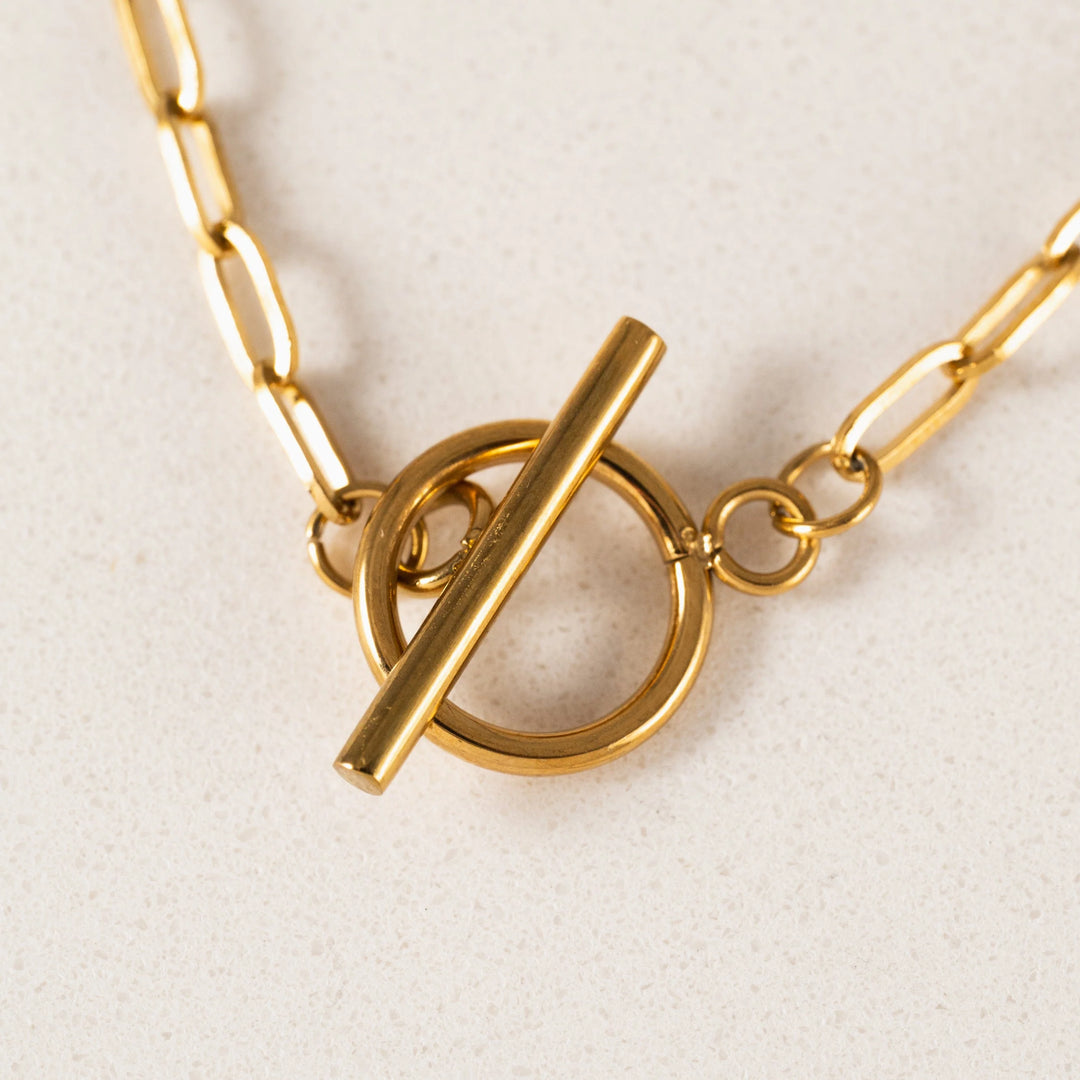 Lover's Tempo Darcy Toggle Clasp Gold Necklace featuring a stylish toggle closure and elegant gold chain.