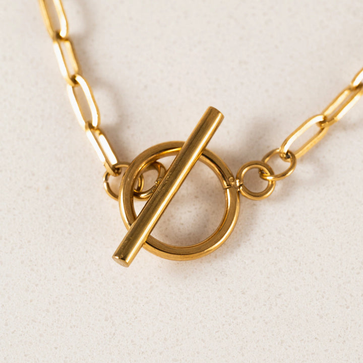 Lover's Tempo Darcy Toggle Clasp Gold Necklace featuring a stylish toggle closure and elegant gold chain.