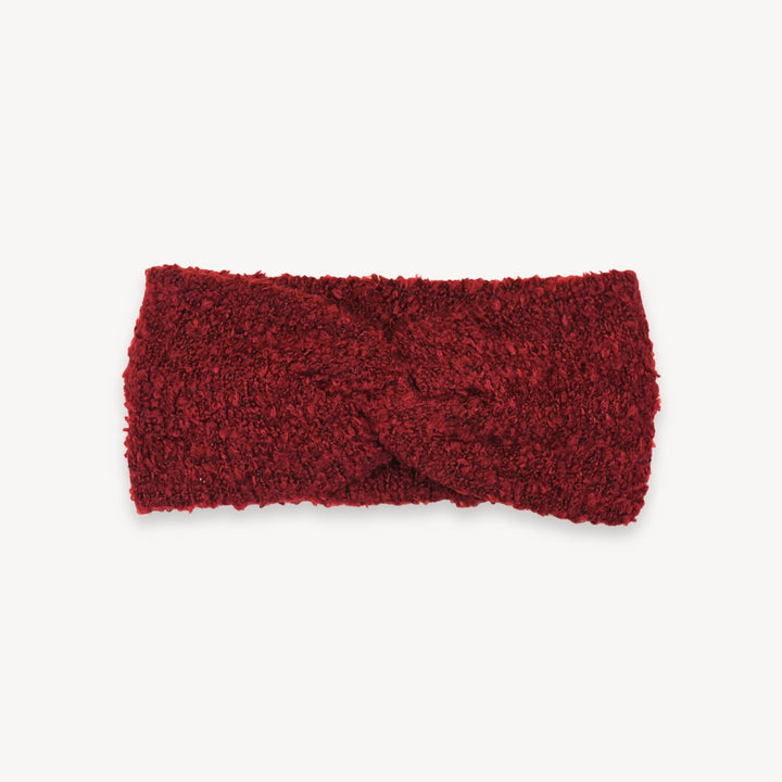 Red textured headband on a white background