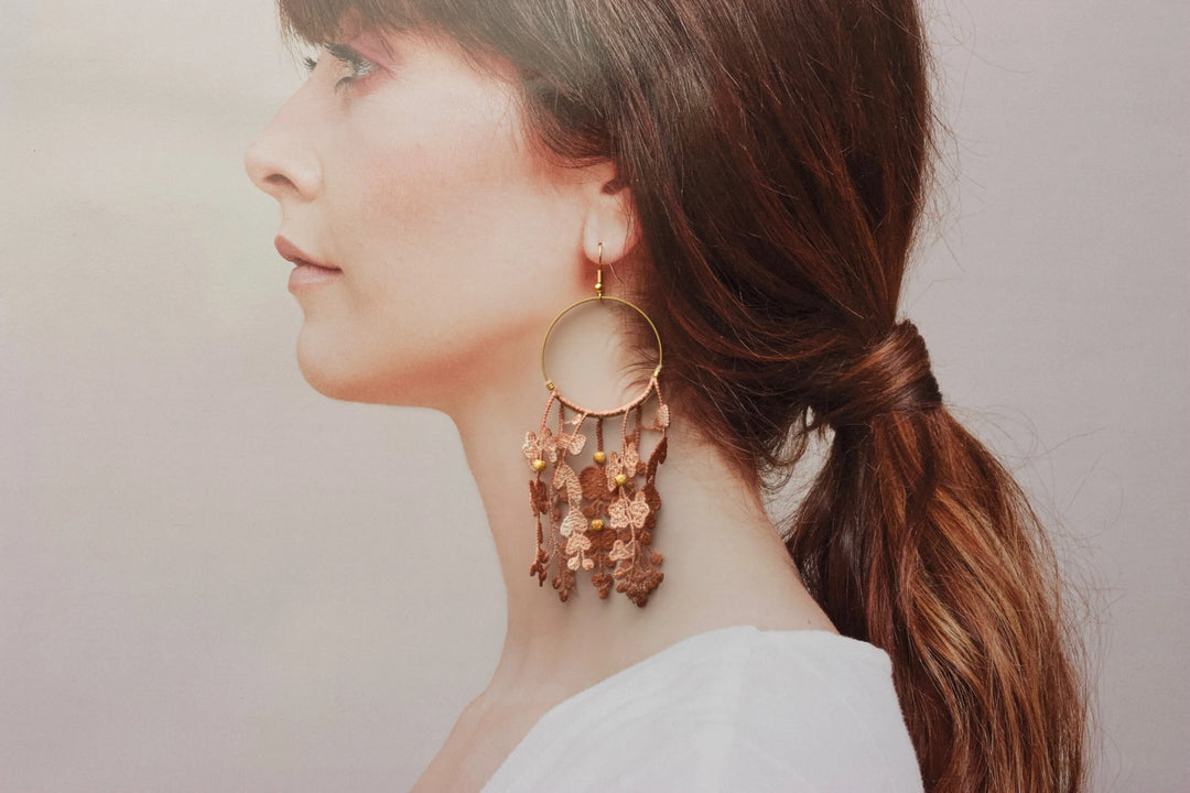Ilk Jewelry Duo des Fleurs hoop earrings featuring delicate floral designs in vintage lace and gold-tone metal, perfect for elegant accessory styles.