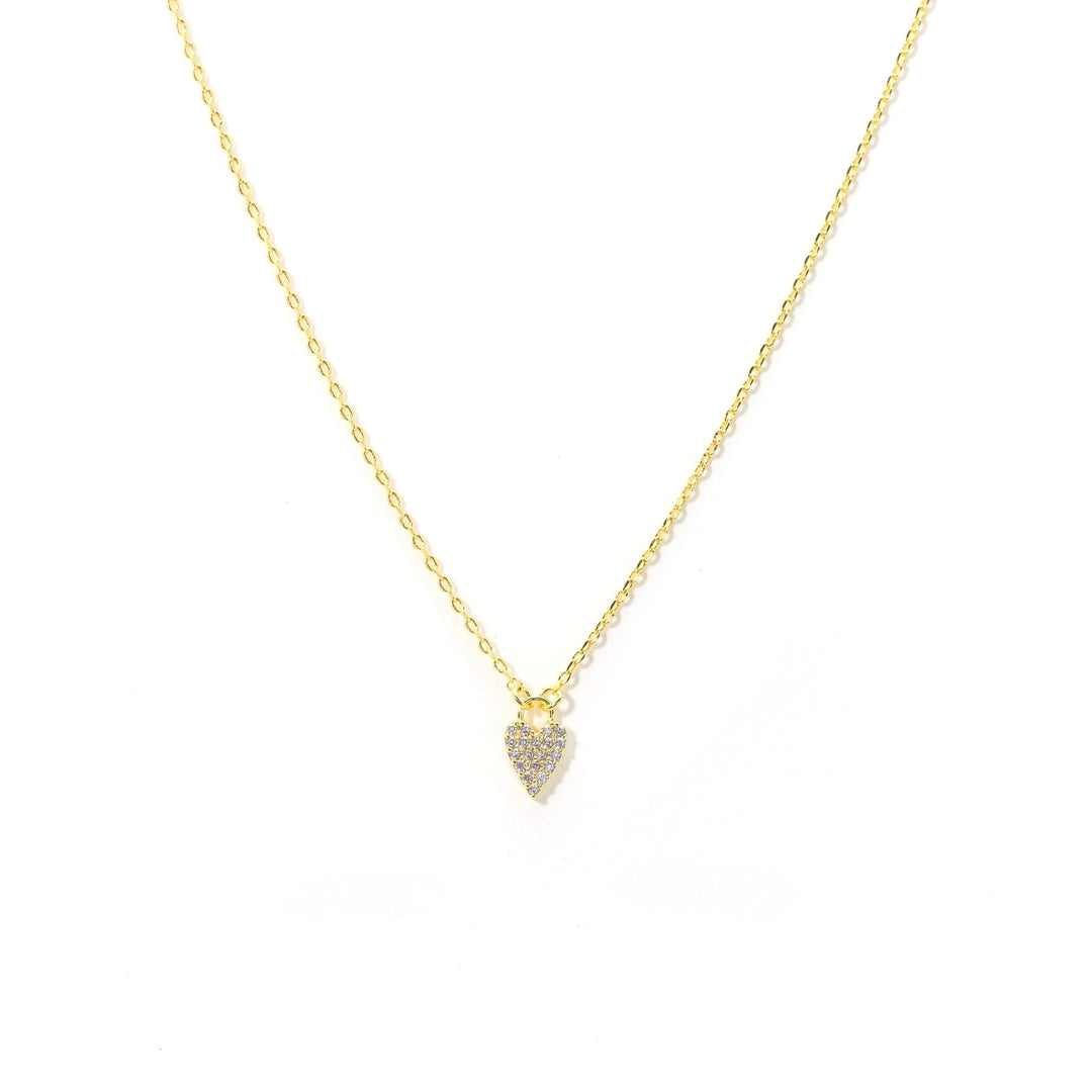 Gold necklace with a teardrop-shaped pendant on a white background