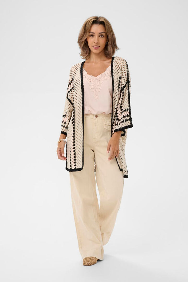 Cream Free Fly crochet kimono with intricate open-knit design, lightweight and stylish for casual retro styler.