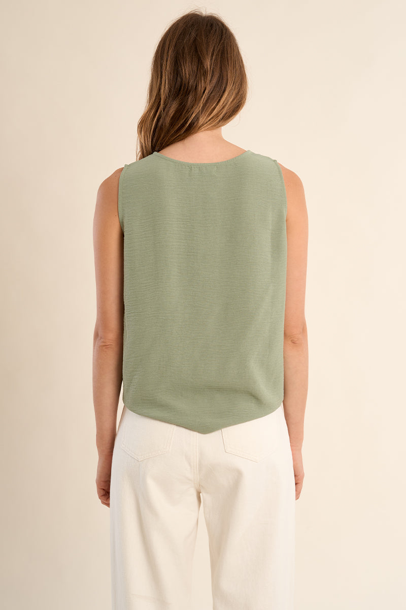 Molly Bracken Maren sleeveless tie-waist blouse, stylish tank top with lightweight sage green fabric and a bow tie detail at the waist.