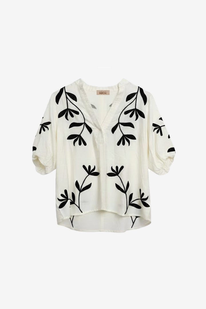 NKN by Nekane Fatima floral embroidered blouse featuring intricate embroidery and lightweight fabric, stylish for casual or dressy wear.