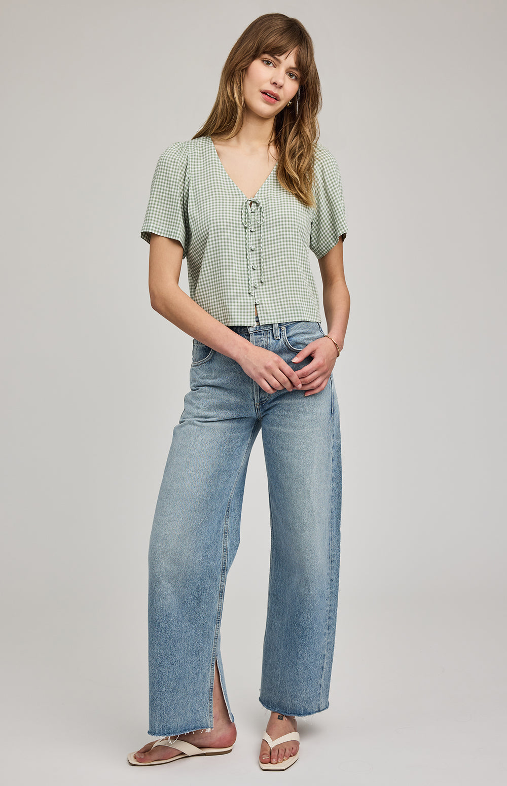 Gentle Fawn Becca Gingham Short Sleeve Blouse featuring a classic gingham pattern and lightweight fabric, perfect for casual wear.