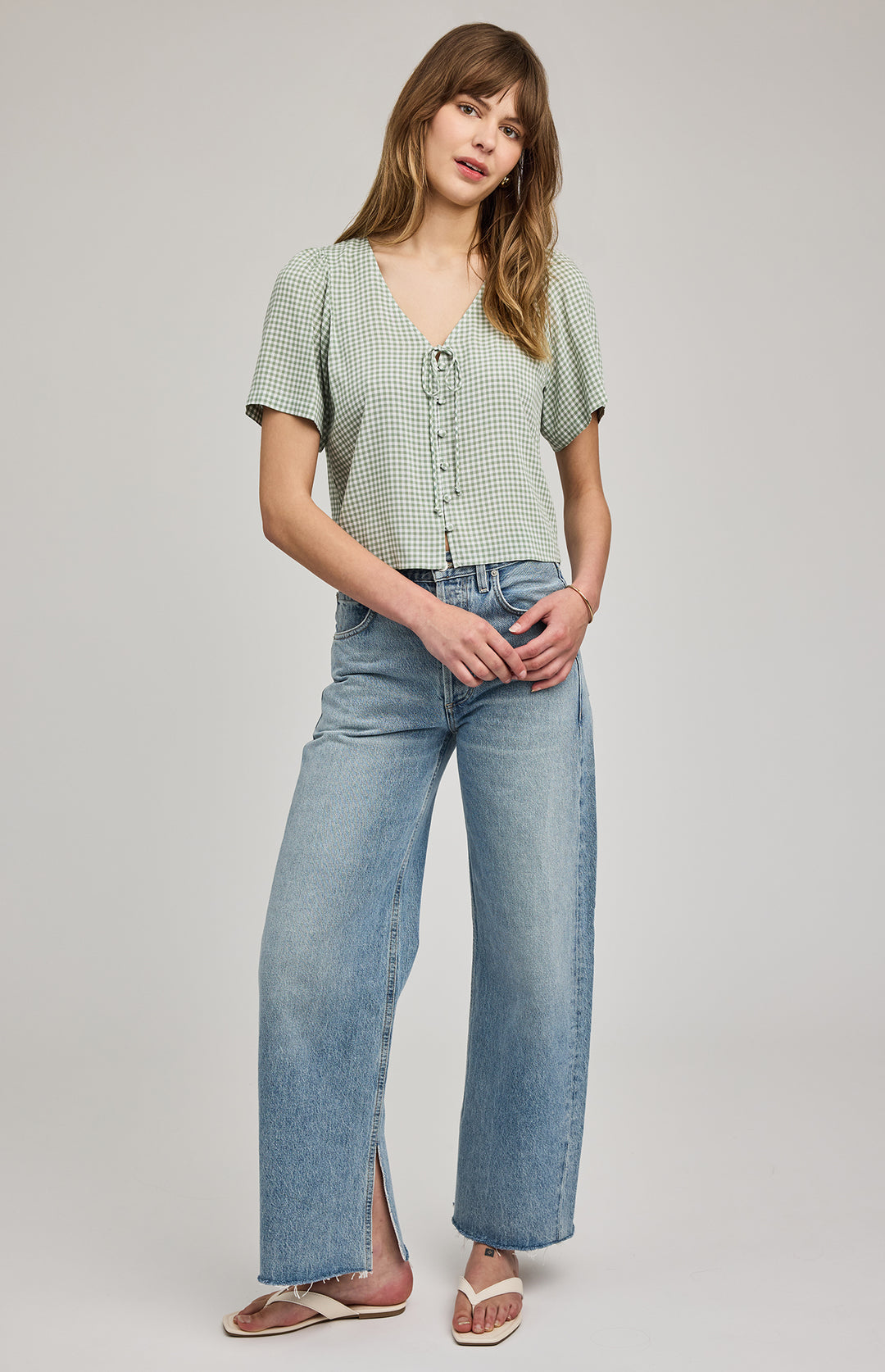 Gentle Fawn Becca Gingham Short Sleeve Blouse featuring a classic gingham pattern and lightweight fabric, perfect for casual wear.