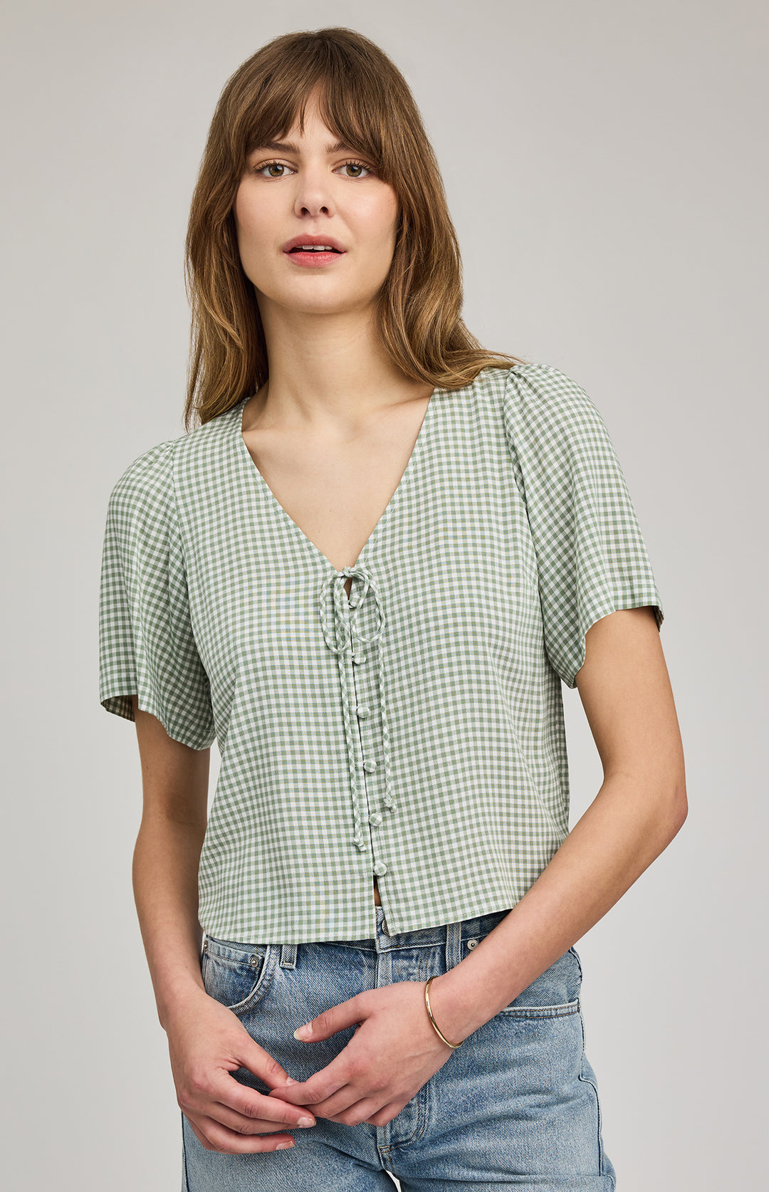 Gentle Fawn Becca Gingham Short Sleeve Blouse with a classic checkered pattern, lightweight fabric, and relaxed fit.