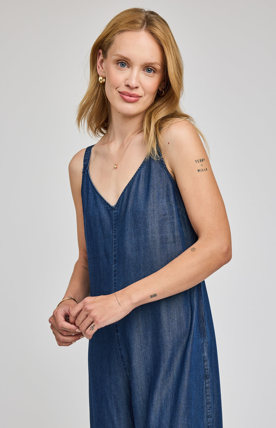 Gentle Fawn Cambry Denim Jumpsuit romper with adjustable straps and side pockets, casual and stylish for everyday wear.