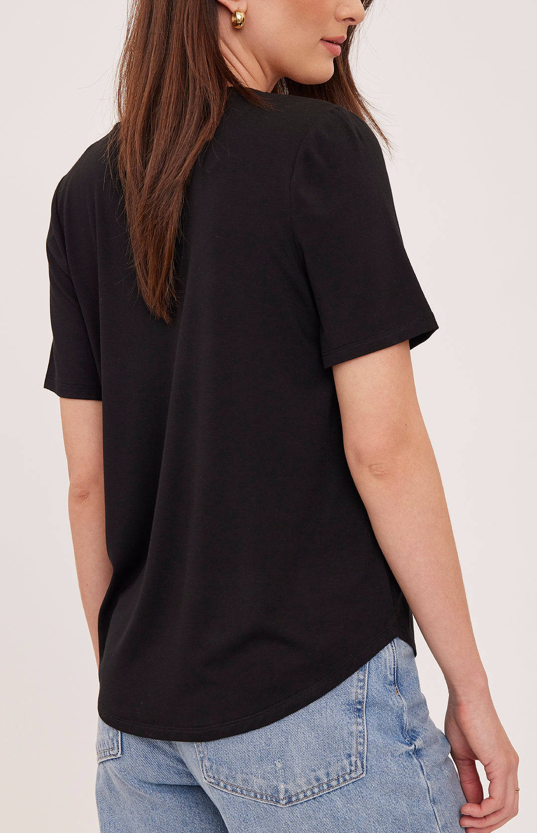 Black Jamie V-Neck T-Shirt by Gentle Fawn, casual fit with V-neckline, soft fabric, displayed on a hanger.