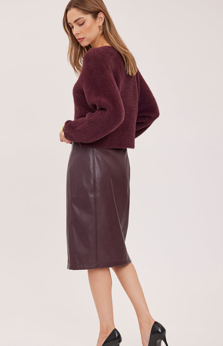 Gentle Fawn Lydia vegan leather skirt in port color, showing a stylish high-waisted design with smooth texture and clean finish.