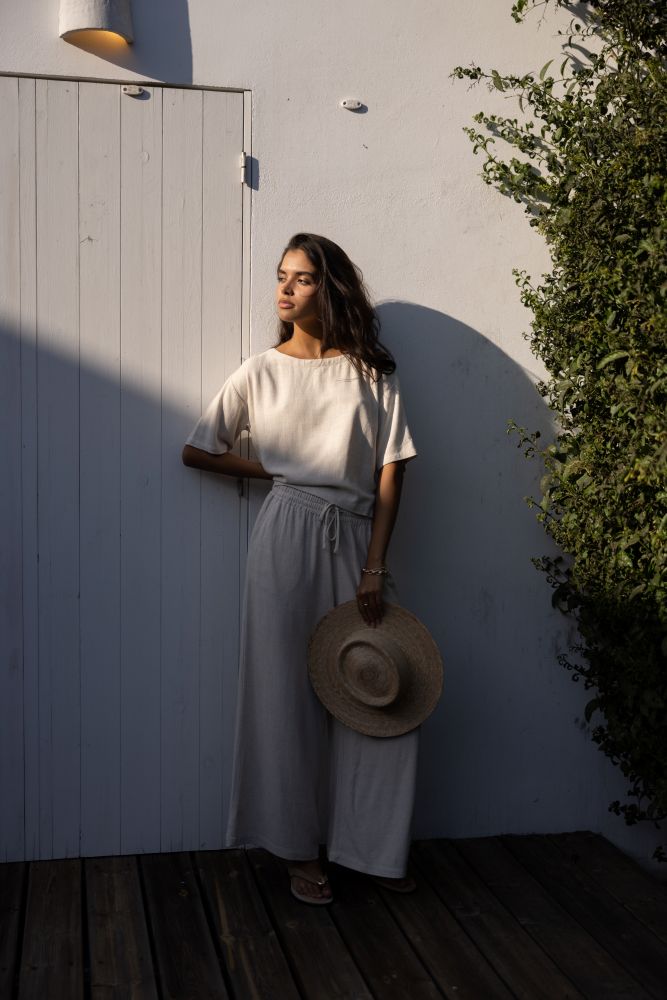 Gentle Fawn Arlo Linen Pant showing relaxed fit, lightweight linen blend fabric, and natural beige color on a model.
