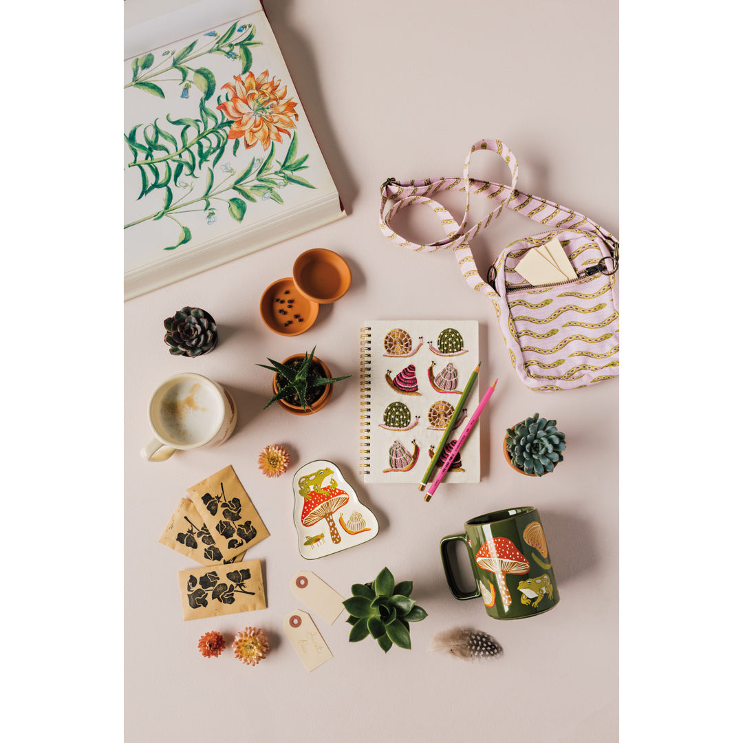 Danica Gardenland embroidered snail notepad featuring a charming snail design on the cover for garden lovers and note-taking.