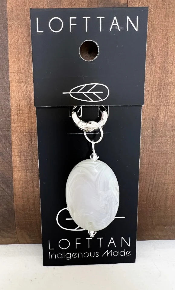 Lofttan moonstone agate semi precious stone jewelry pendant featuring a sleek, minimalist design with intricate detailing, perfect for elegant accessories.