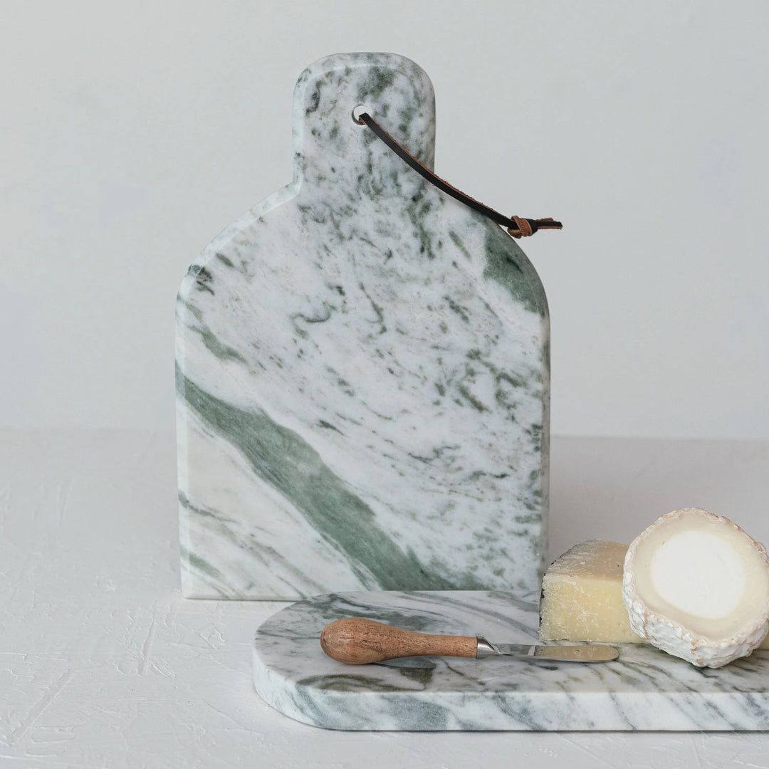 Marble cheese board with canape knife from Creative Co-op, featuring a smooth surface and elegant design for serving cheeses and appetizers.