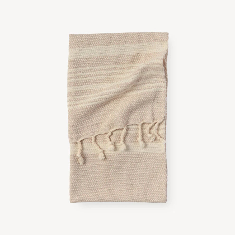 Turkish cotton hand towel from Pokoloko with intricate Hasir pattern, soft texture, and neutral colors for elegant bathroom decor.