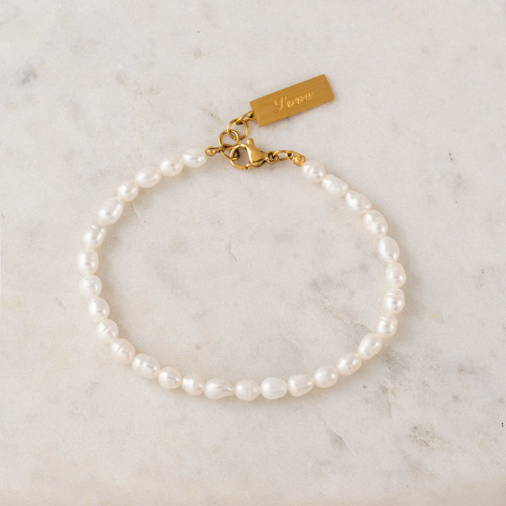 Isola Pearl Bracelet by Lover's Tempo featuring elegant white pearls on a delicate gold chain