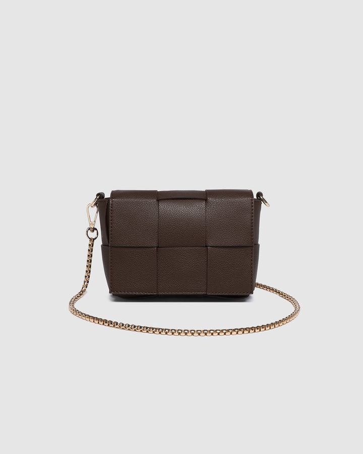 Louenhide Josephine crossbody bag in brown with chain strap, featuring sleek woven design and compact interior for everyday use.