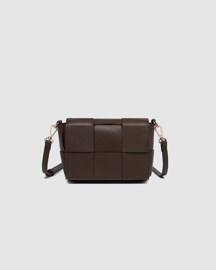Louenhide Josephine Crossbody Bag shown with chain strap and compact interior in brown vegan leather.