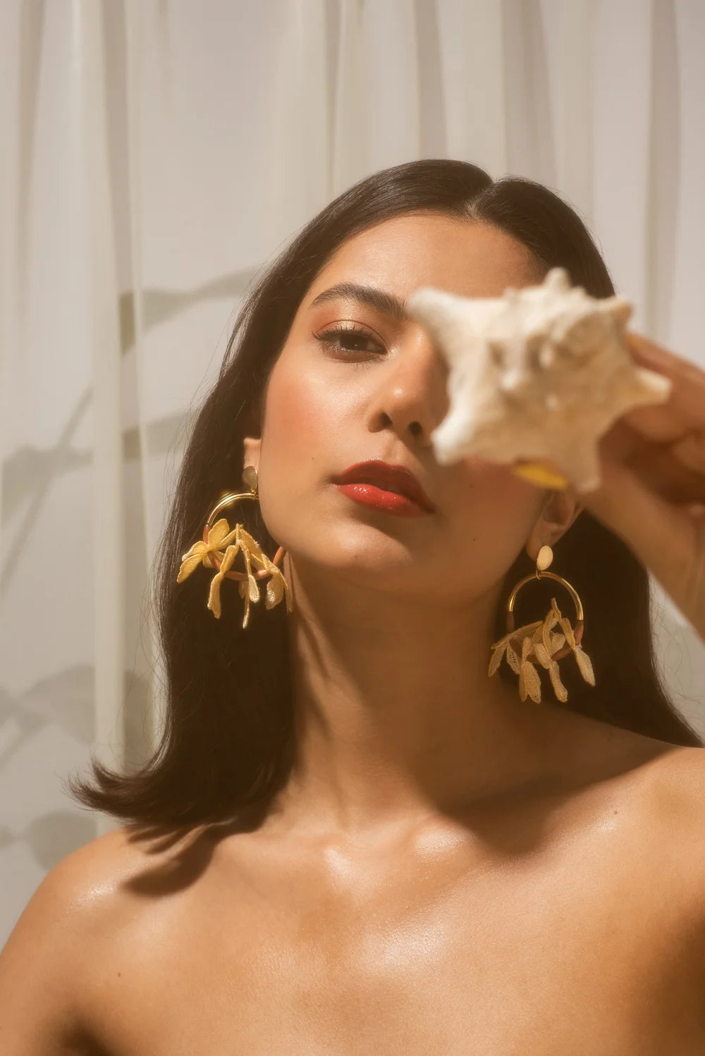 Ilk Jewelry Kui Lei Flower hoop earring featuring a delicate floral design in vintage lace and gold-tone finish..