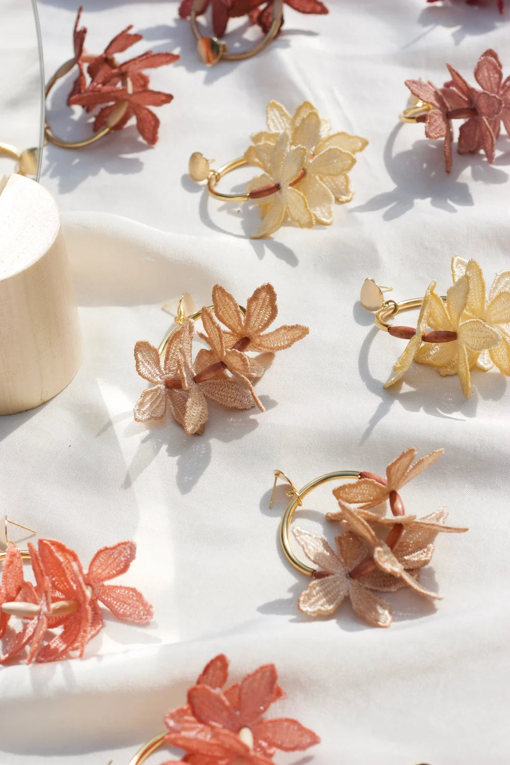 Kui Lei Flower Hoop Earring by Ilk Jewelry featuring delicate floral design in vintage lace and on gold hoop for elegant style