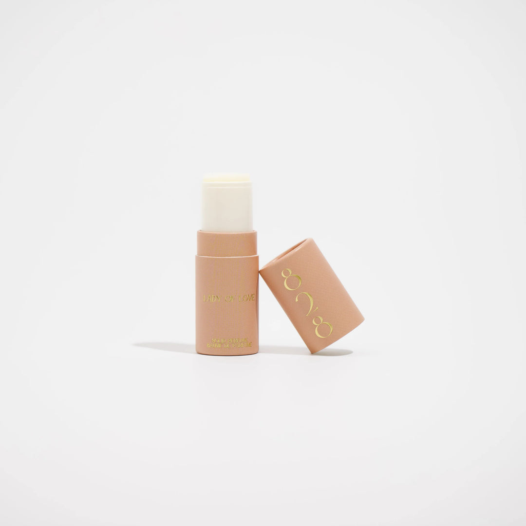 Lady of Love solid perfume by 828 Aroma Inc. in a sleek compact case, featuring elegant floral design and creamy solid fragrance.