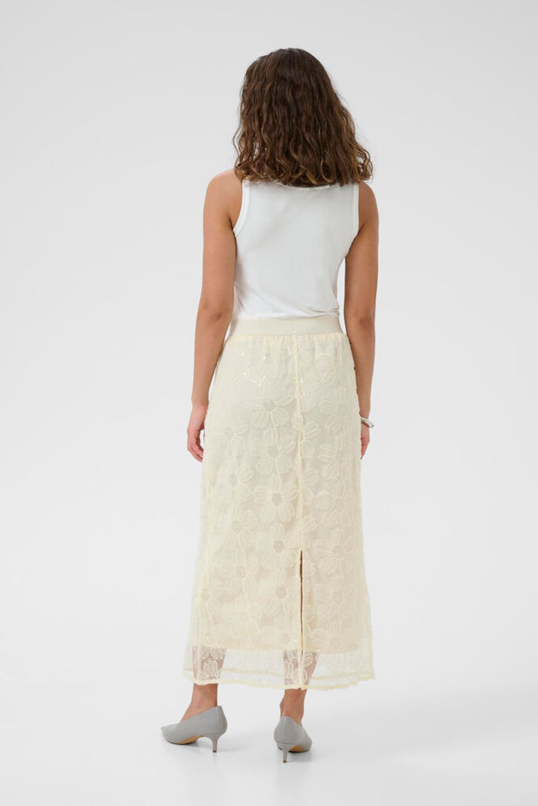 Culture Mera Flower Sequin Skirt featuring yellow flower patterns and shimmering sequins, stylish and eye-catching for festive occasions.