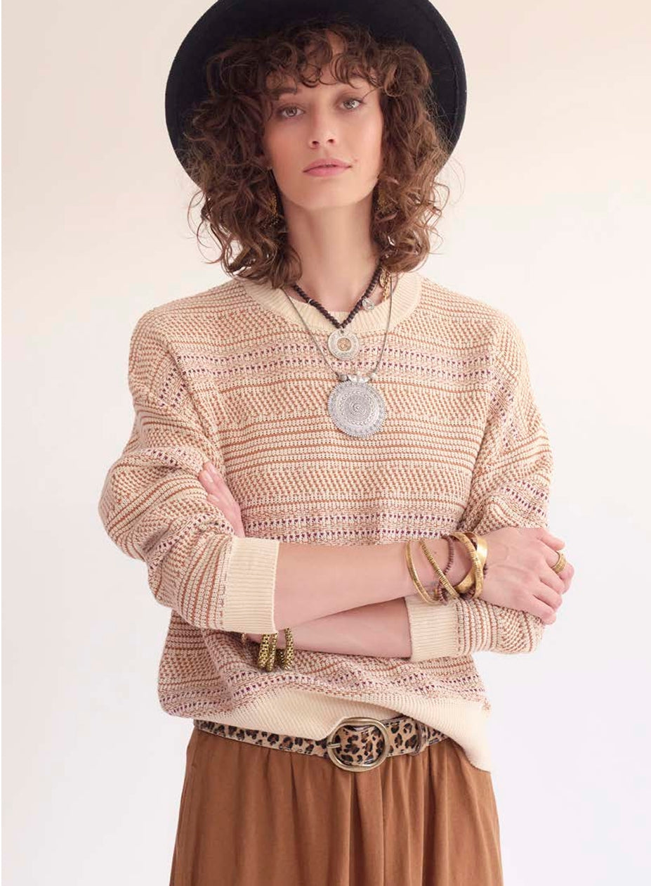 MKT Studio Dariana Leopard leather belt featuring a bold animal print and sleek design, displayed on a neutral background.