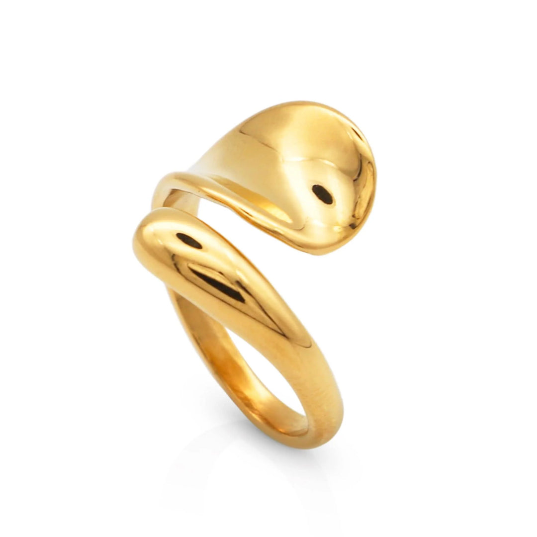 Gold ring with a unique twisted band design on a white background
