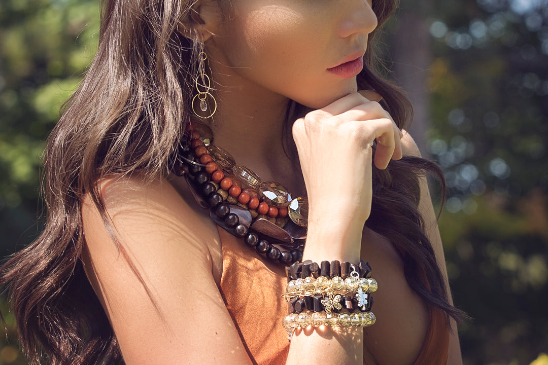 Lofttan Longhouse Ebony Wood Bracelet featuring smooth, dark wood beads strung on an elastic band for stylish natural modern wristwear.