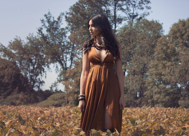 Lofttan Nay Palm Wood Necklace featuring a natural wooden pendant on a cord, stylish and lightweight jewelry accessory.