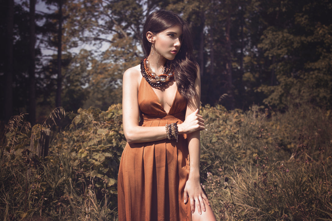 Lofttan Nay Palm Wood Necklace featuring a natural wooden pendant on a simple cord, showcasing handcrafted jewelry style.