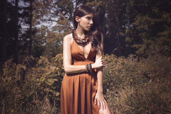 Lofttan Nay Palm Wood Necklace featuring a natural wooden pendant on a simple cord, showcasing handcrafted jewelry style.