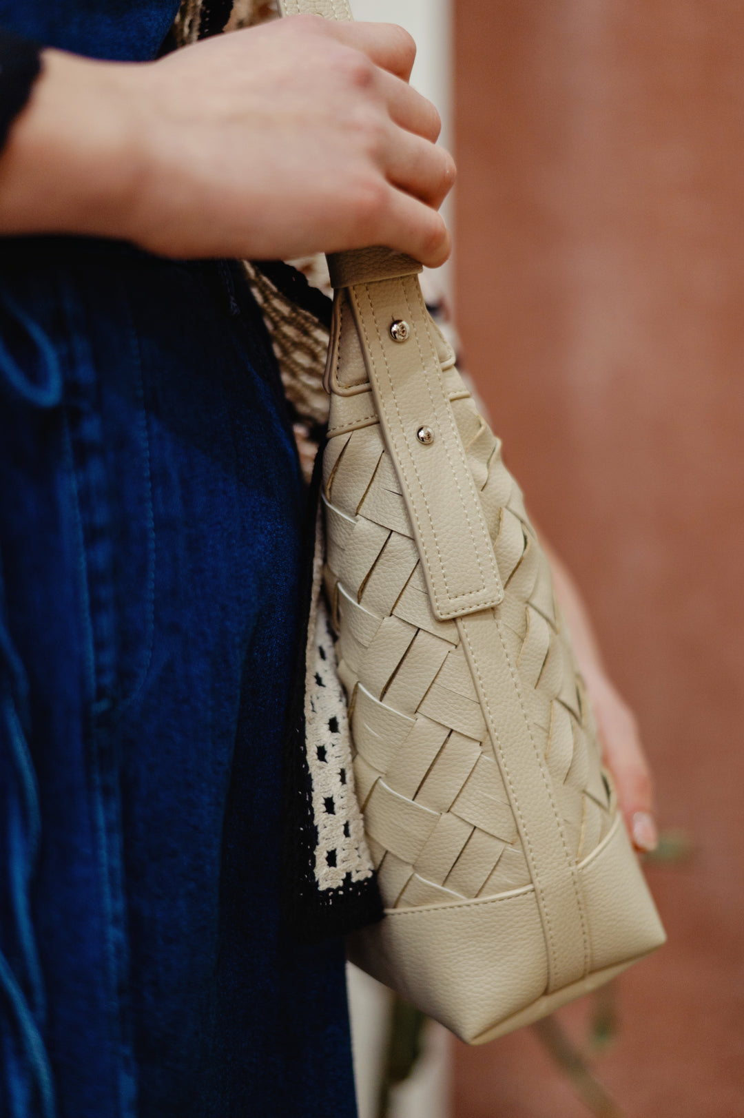 Colab Gracia shoulder and crossbody bag with adjustable strap, stylish woven design, and multiple compartments for everyday use.