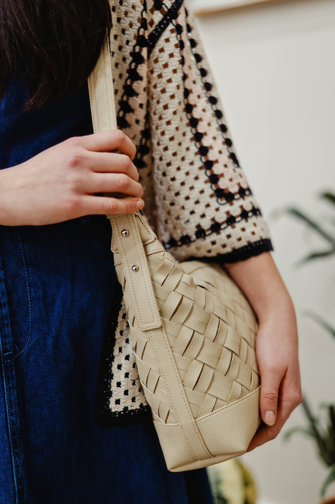 Colab Gracia shoulder and crossbody bag with adjustable strap and woven vegan leather design stylish and versatile for everyday use.
