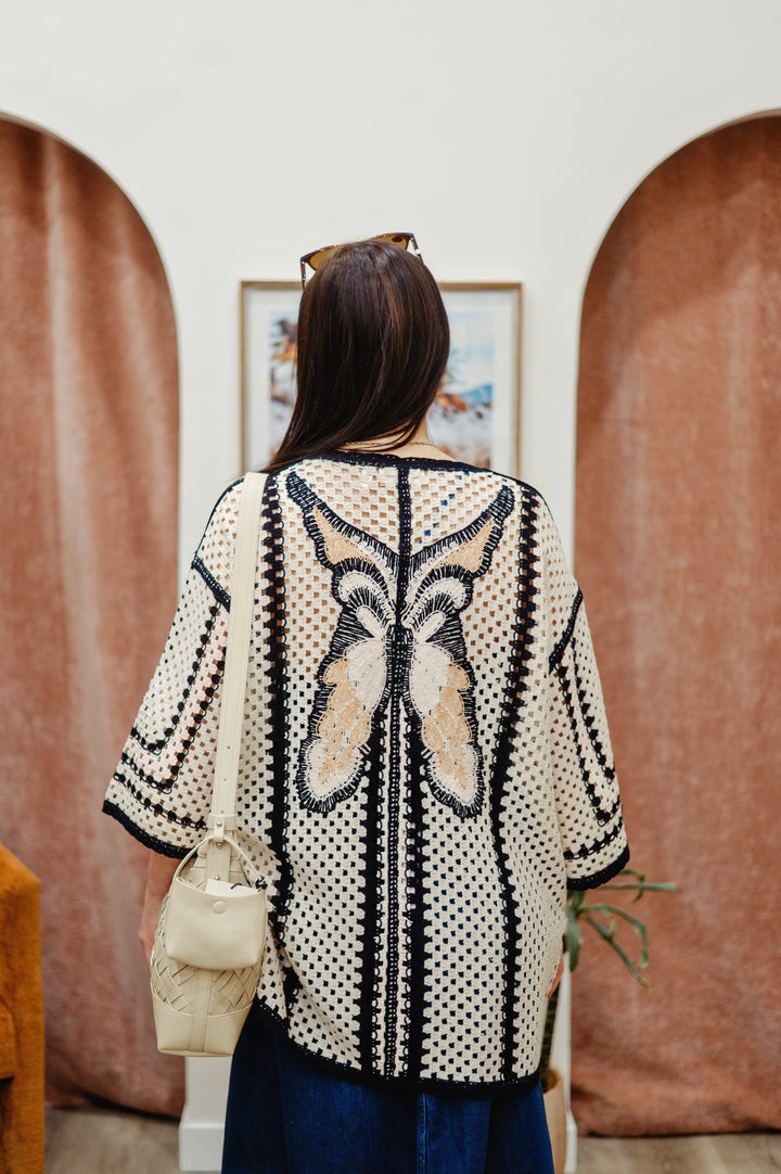 Cream Free Fly crochet kimono featuring intricate open-knit design, lightweight and stylish for casual or beachwear.