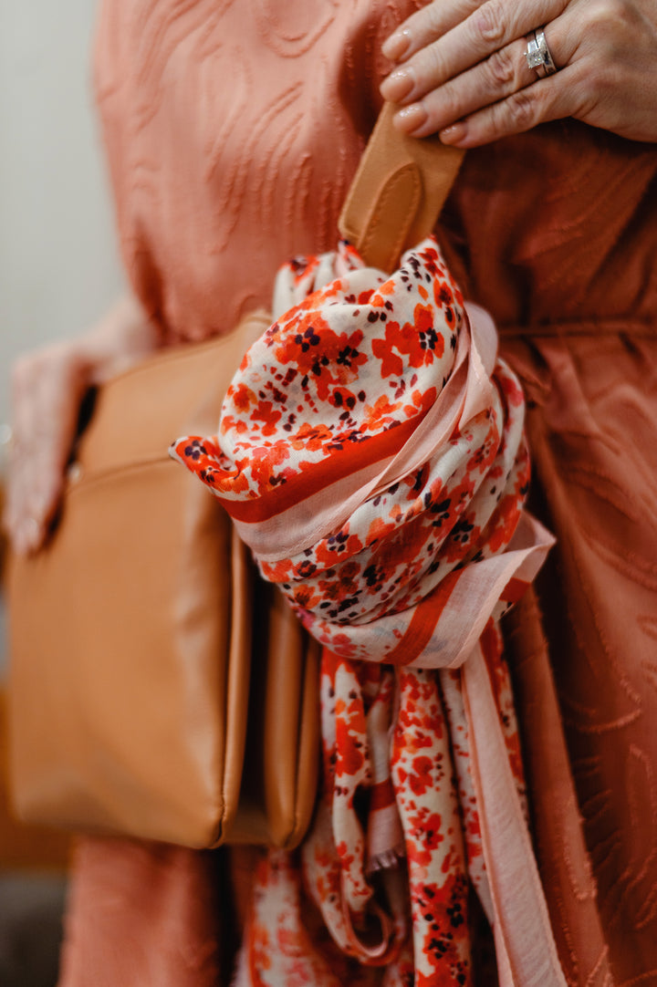 FRANSA Sanni floral scarf featuring vibrant, colorful floral patterns on lightweight fabric, ideal for stylish accessories.