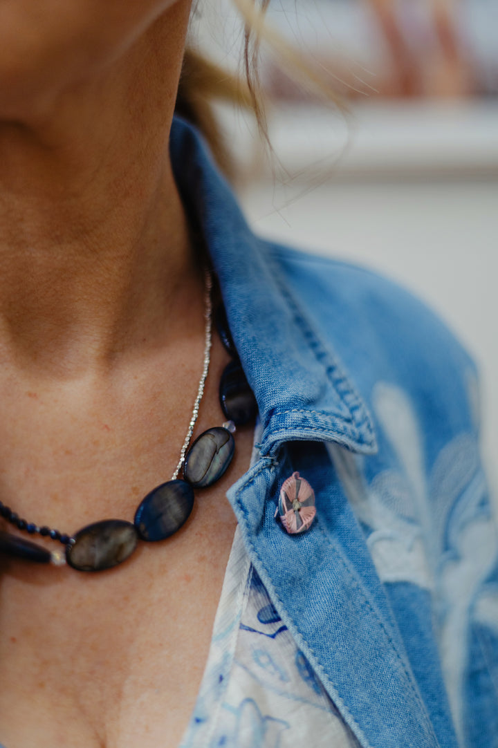 Lofttan Trent Oyster Shell Necklace featuring natural oyster shell pendant on a delicate chain.