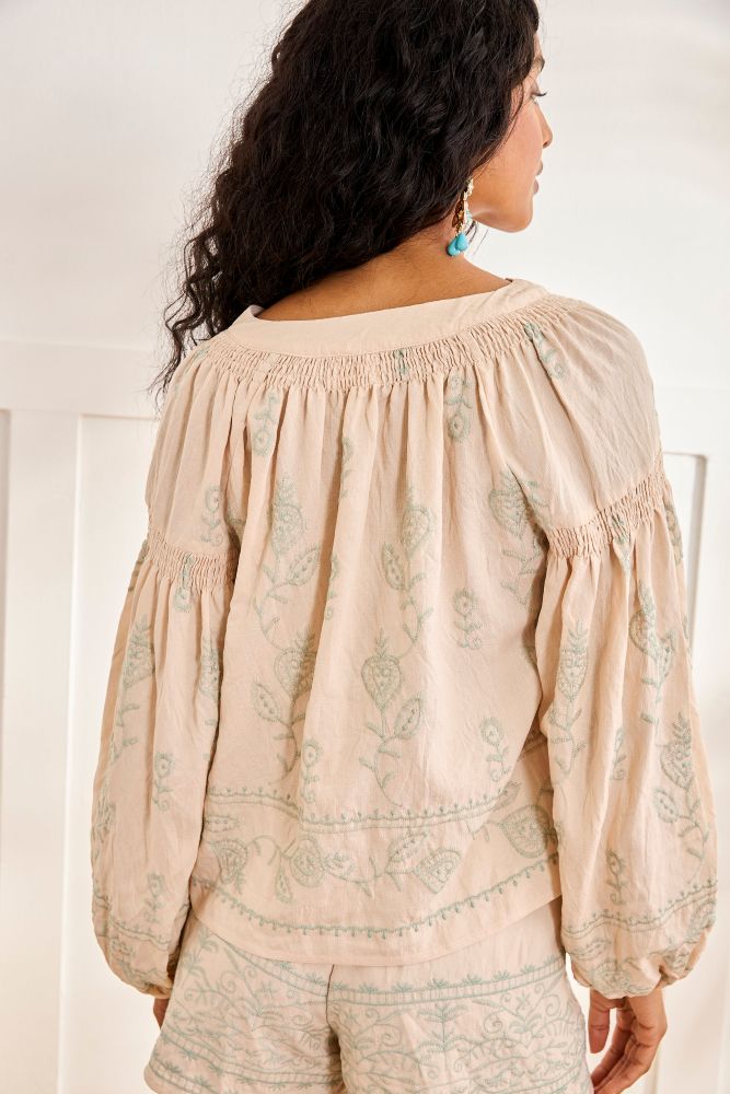 NKN by Nekane Mira Mint embroidered blouse with intricate floral embroidery and lightweight beige fabric, perfect for casual or dressy wear.