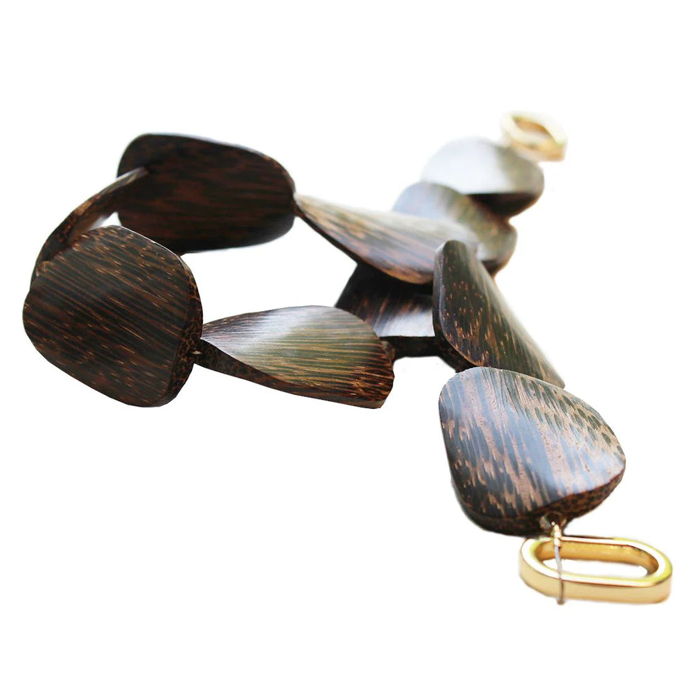 Lofttan Nay Palm Wood Necklace featuring a natural wooden pendant on a simple chain, ideal for casual and bohemian style.